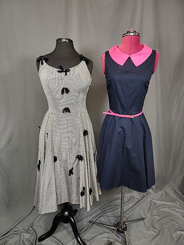 2 Sleeveless Dresses. Includes