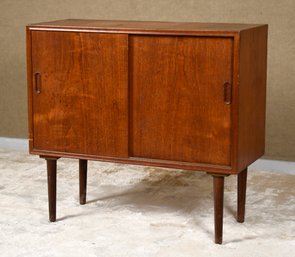 A small unsigned vintage Danish teak