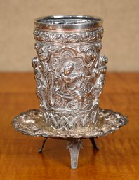 Asian silver cup with high relief