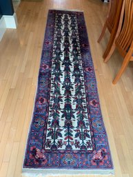 A vintage Oriental runner, a blue,