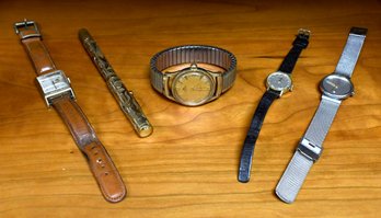 Four vintage wristwatches including  30cc26