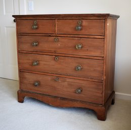 An antique cottage pine chest with two-over-three