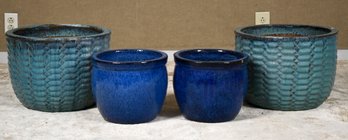 A pair of large teal glazed textured