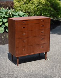 An un-signed vintage teak wood five