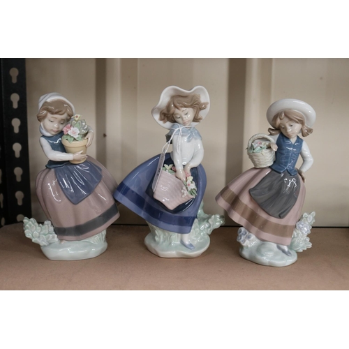 Three Lladro figures girls with baskets