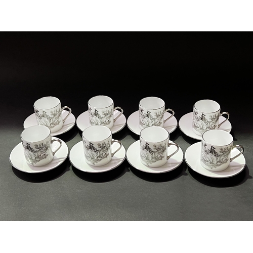 Set of eight Limoges demi tasses