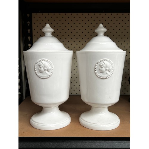 Two French style lidded pottery jars,