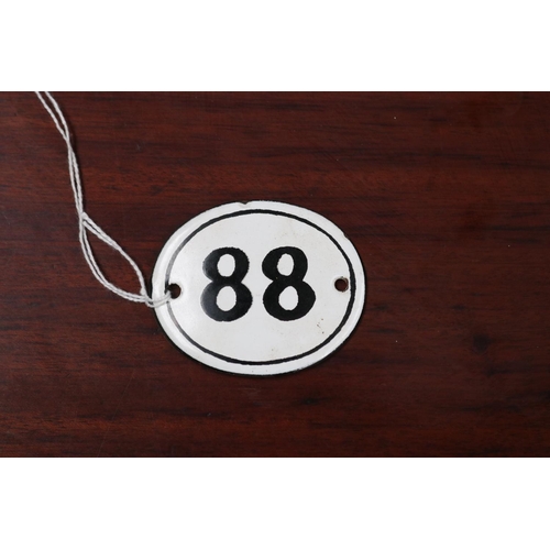 Black and white enamel No 88 house number,