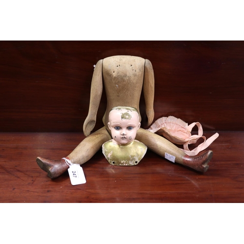 Antique articulated wooden doll with