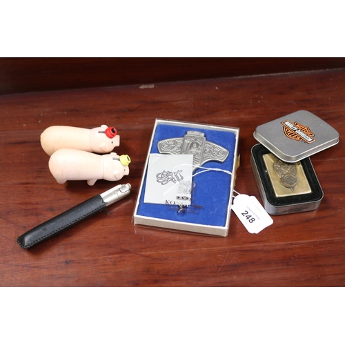 Assortment of items to include Pig lighters