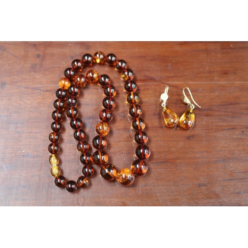 Amber drop earrings and a necklace (2)