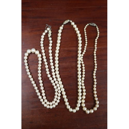 Three strands of cultured pearl necklaces
