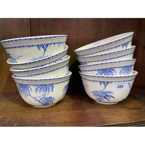 Set of eight blue and white bowls,