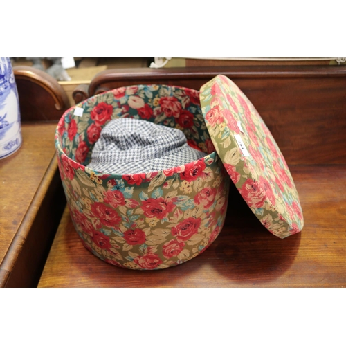 Floral material hat box with hats,