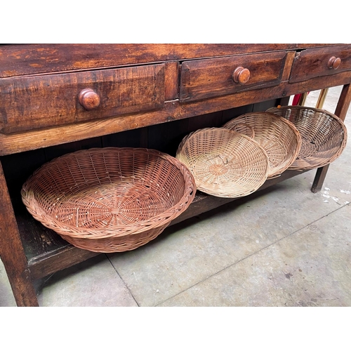 Four French cane baskets, approx