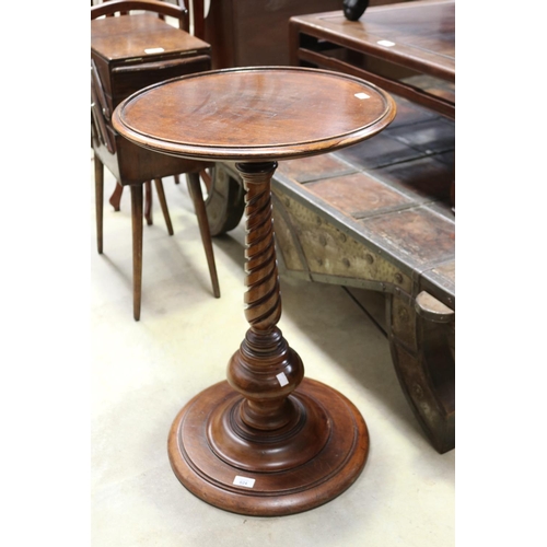 Antique circular pedestal dish top table.