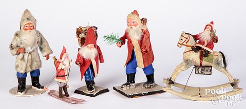 FIVE SANTA FIGURESFive Santa figures