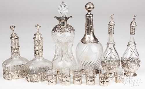 SILVER MOUNTED BOTTLES AND CORDIALS,