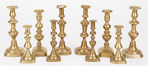 FIVE PAIRS OF VICTORIAN BRASS CANDLESTICKSFive