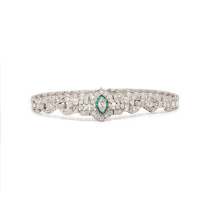 ART DECO DIAMOND AND EMERALD BRACELET Containing 30ad26