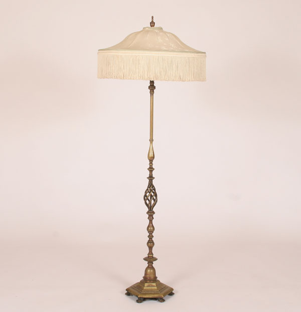 Brass floor lamp; turned and hand