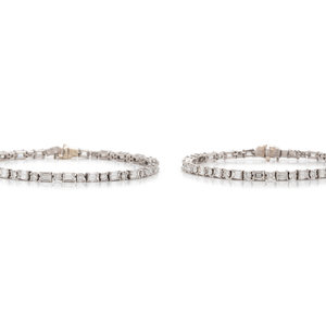 PAIR OF DIAMOND BRACELETS Containing 30ae18