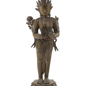 A Nepalese Bronze Figure of a Standing