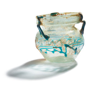 A Roman Pale Blue Glass Jar with