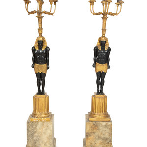 A Pair of Egyptian Revival Ebonized