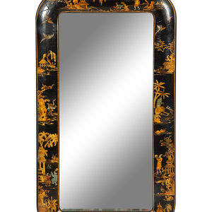 A Black Japanned Cushion Mirror
Late