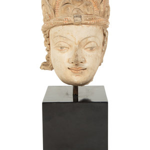 A Chinese Stucco Bodhisattva Head
12th-14th