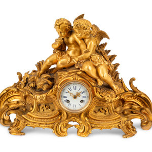 A French Gilt Bronze Figural Mantel 30b0b9