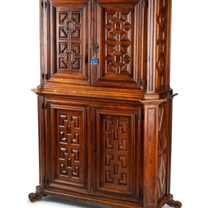 A Continental Walnut Two-Part Cabinet
19th