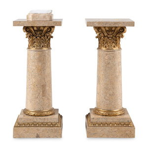 A Pair of Parcel Gilt Composition