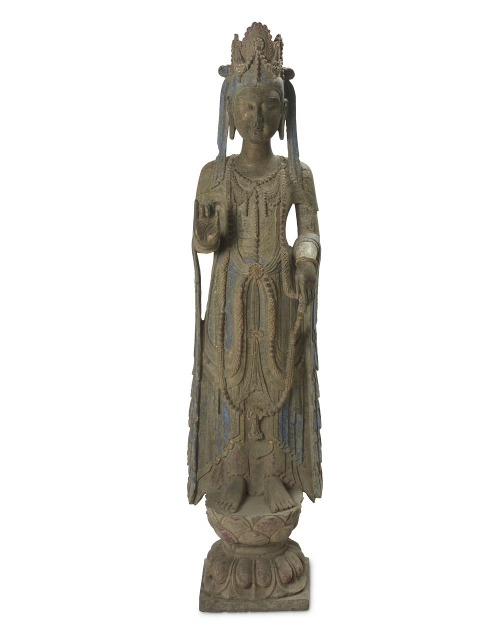 AN EAST ASIAN CAST IRON FIGURE