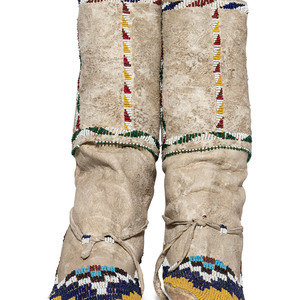 Mescalero Apache Beaded Hide Moccasins
late