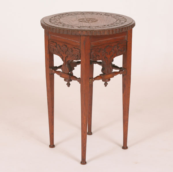 Victorian carved oak lamp table;