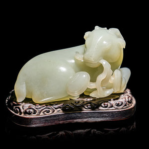 A Chinese Celadon Jade Figure of