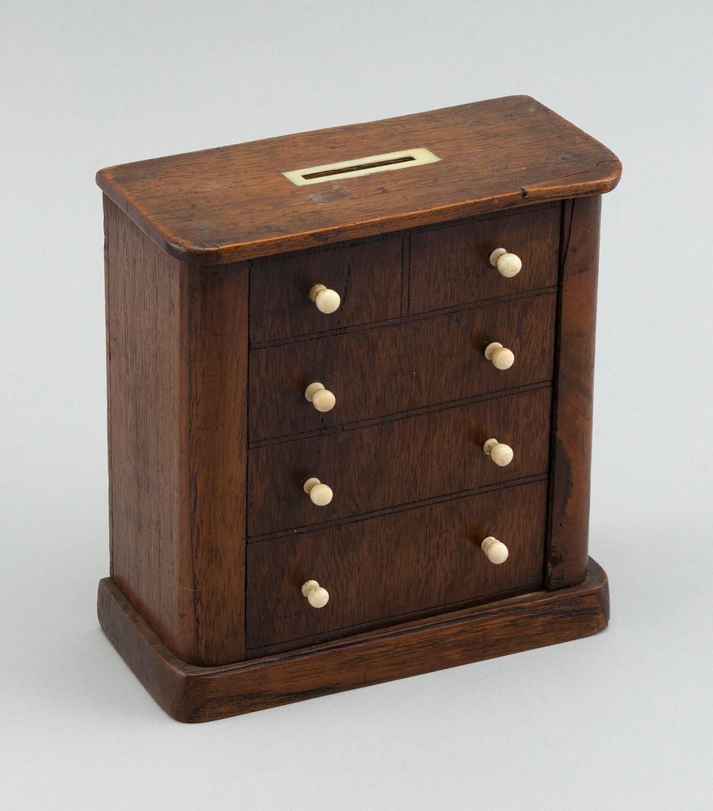 COIN BANK IN THE FORM OF A CHEST