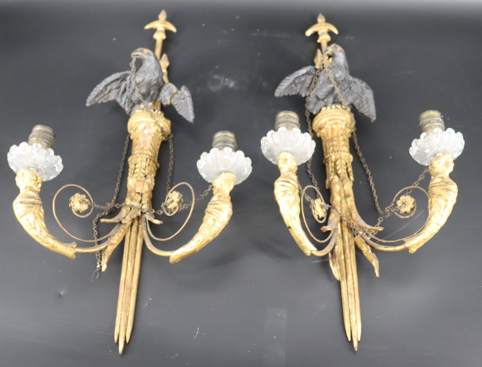 AN ANTIQUE PAIR OF CARVED GILTWOOD