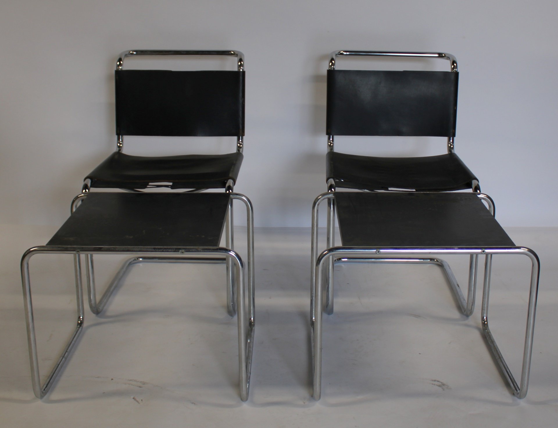 A MIDCENTURY PAIR OF CHROME CHAIRS