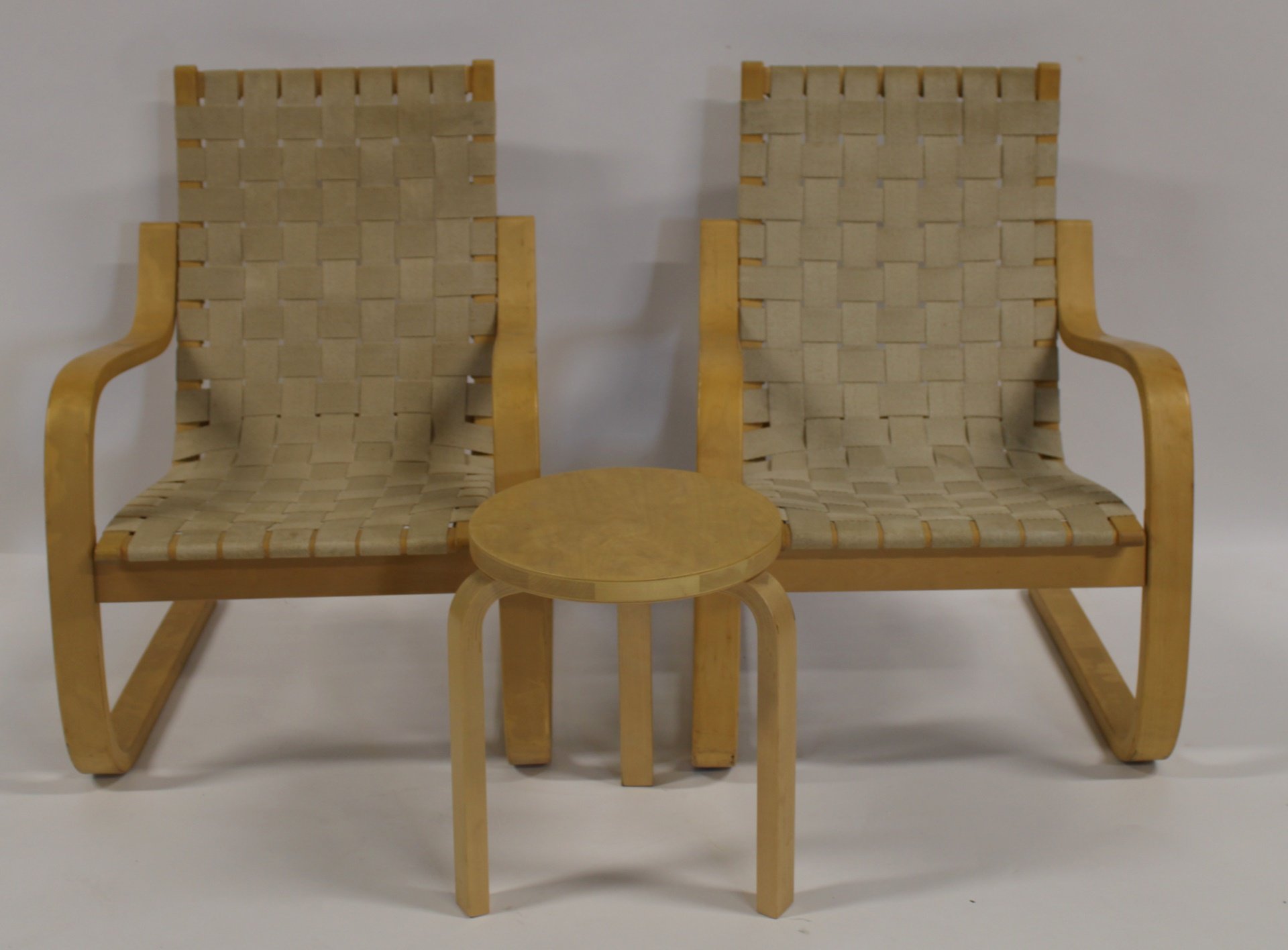 A PAIR OF ALVAR AALTO ARM CHAIRS