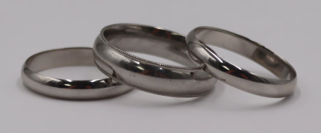 JEWELRY. (3) PLATINUM BAND RINGS.