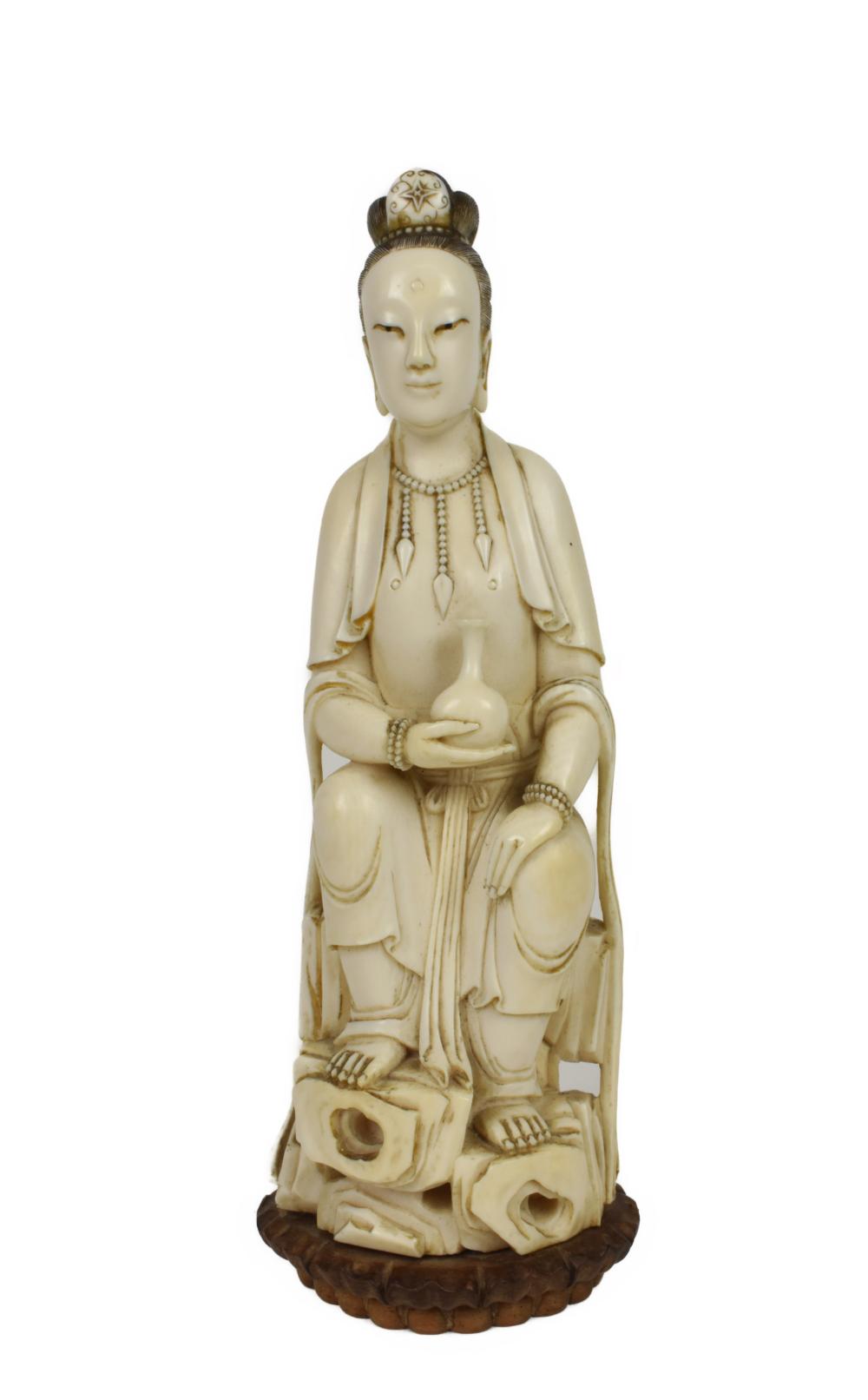 A CHINESE CARVED FIGURE OF A GODDESS 30b9bb