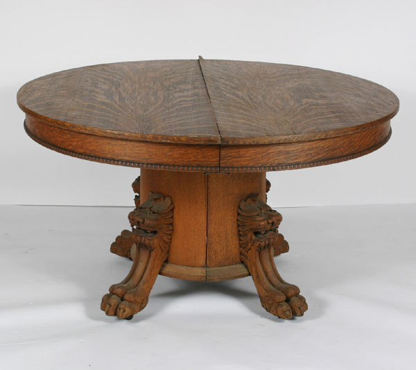 Round oak table; expanding center pedestal