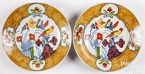 PAIR OF POLYCHROME DELFTWARE CHARGERS,