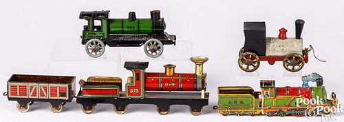 GROUP OF TIN PENNY TOY TRAIN LOCOMOTIVES,