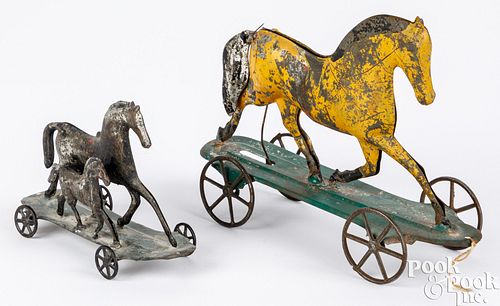 TWO EARLY AMERICAN TIN HORSE PULL