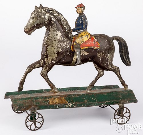 LARGE TIN HORSE AND RIDER PULL 30e652
