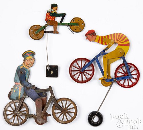 THREE TIN LITHOGRAPH BICYCLE BALANCE